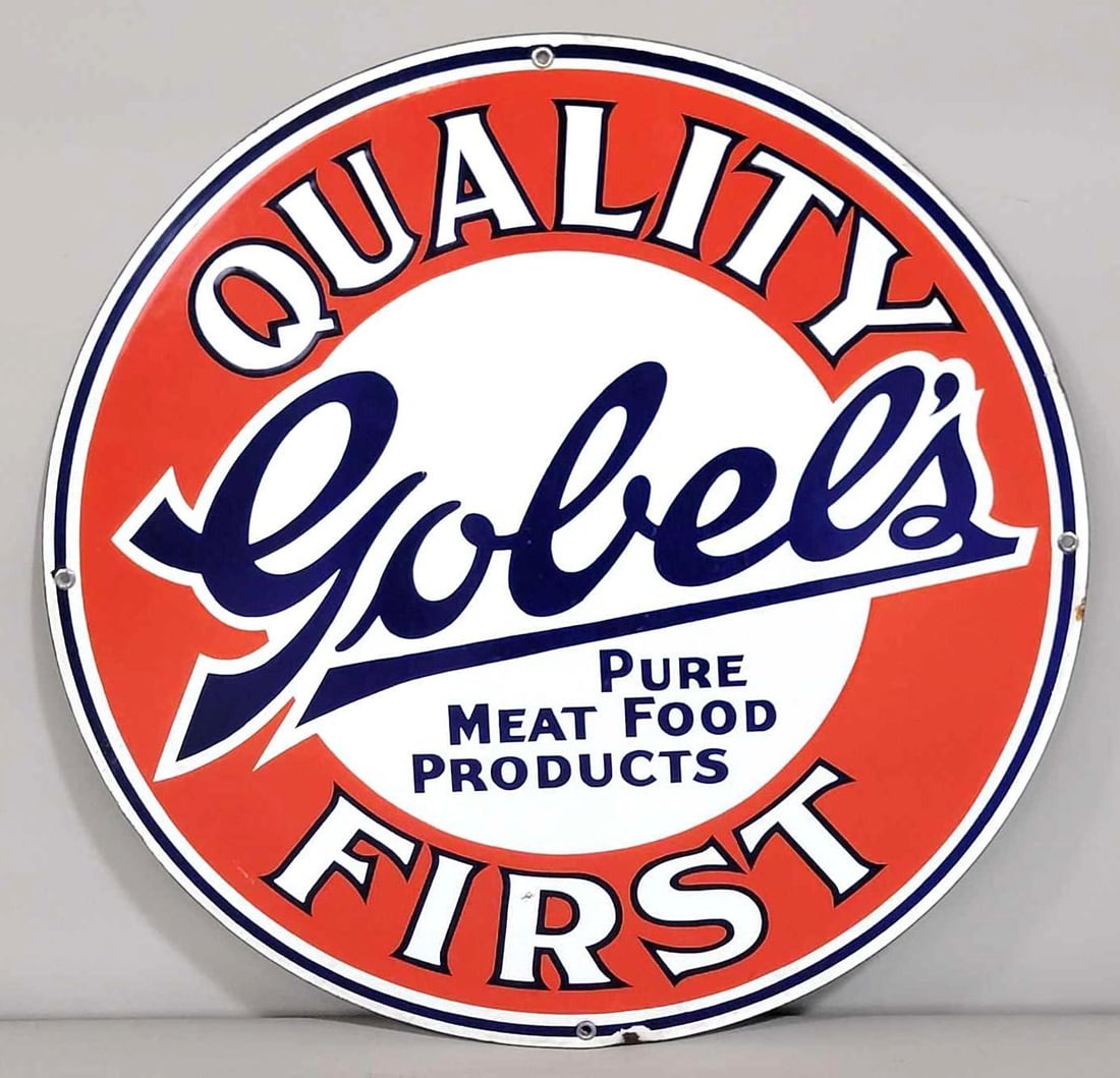 Gobel's Quality First Metal Porcelain Sign (TAC): rated 9, 19"D. This SSP sign has excellent color and gloss with a tiny chip at the bottom. Rarity 3. TAC #061666