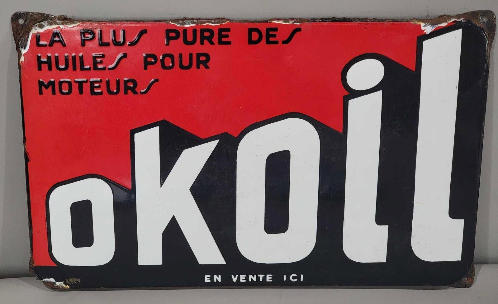 Ok Oil Porcelain Sign (TAC): rated 7.9, 12"x19", the SSP rolled edge sign has good color and gloss, field has light wear, has rust and metal loss along the top edge. TAC #063197