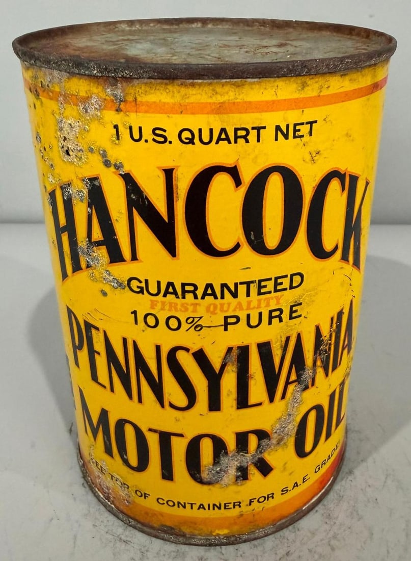 Hancock Motor Oil Metal Quart Can: Rate 6.9, the metal quart can shows wear and damage from age and use