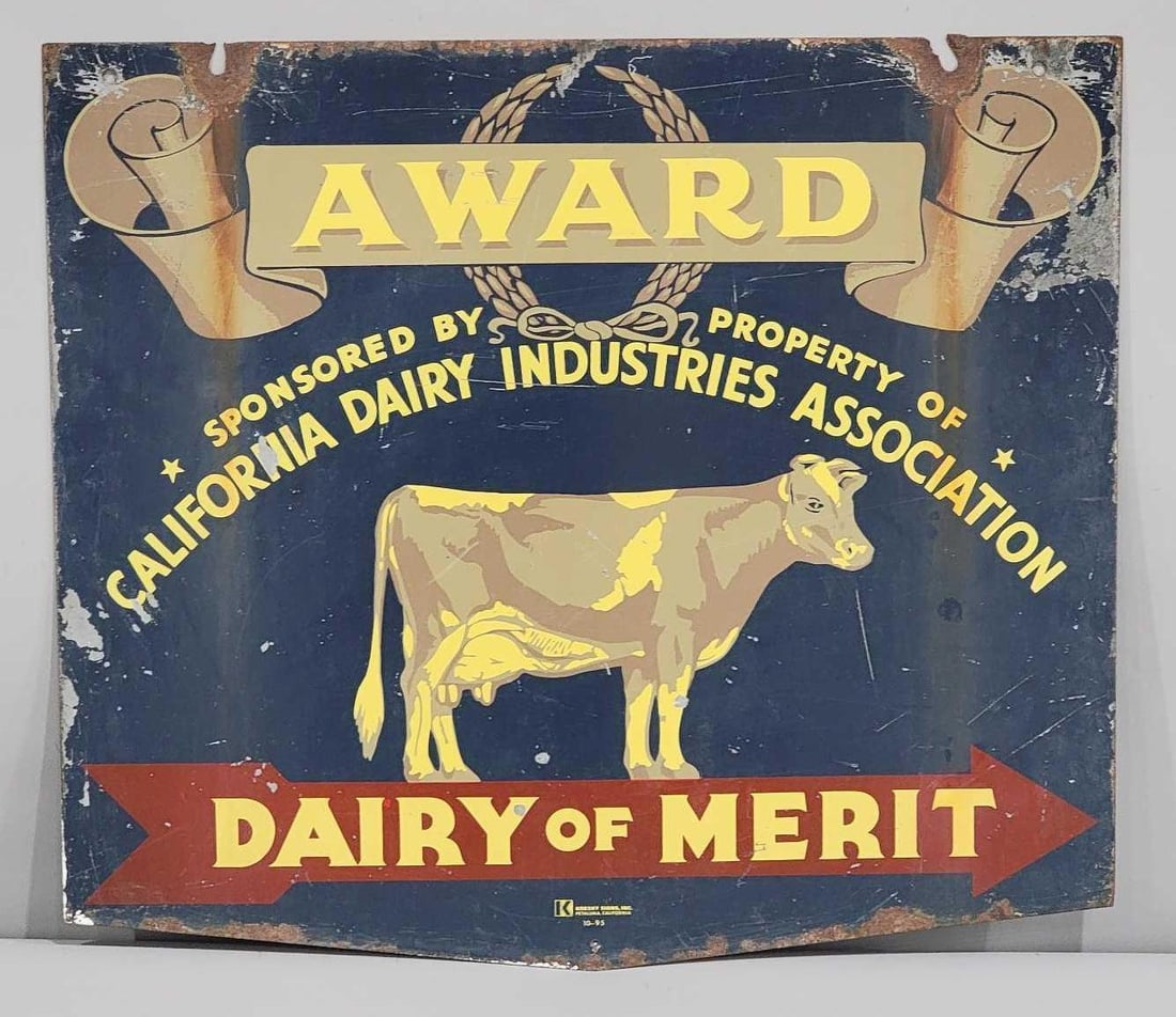 California Dairy Award Metal Sign: rated 6.5, 22"x25", the DST sign has wear and scratches.