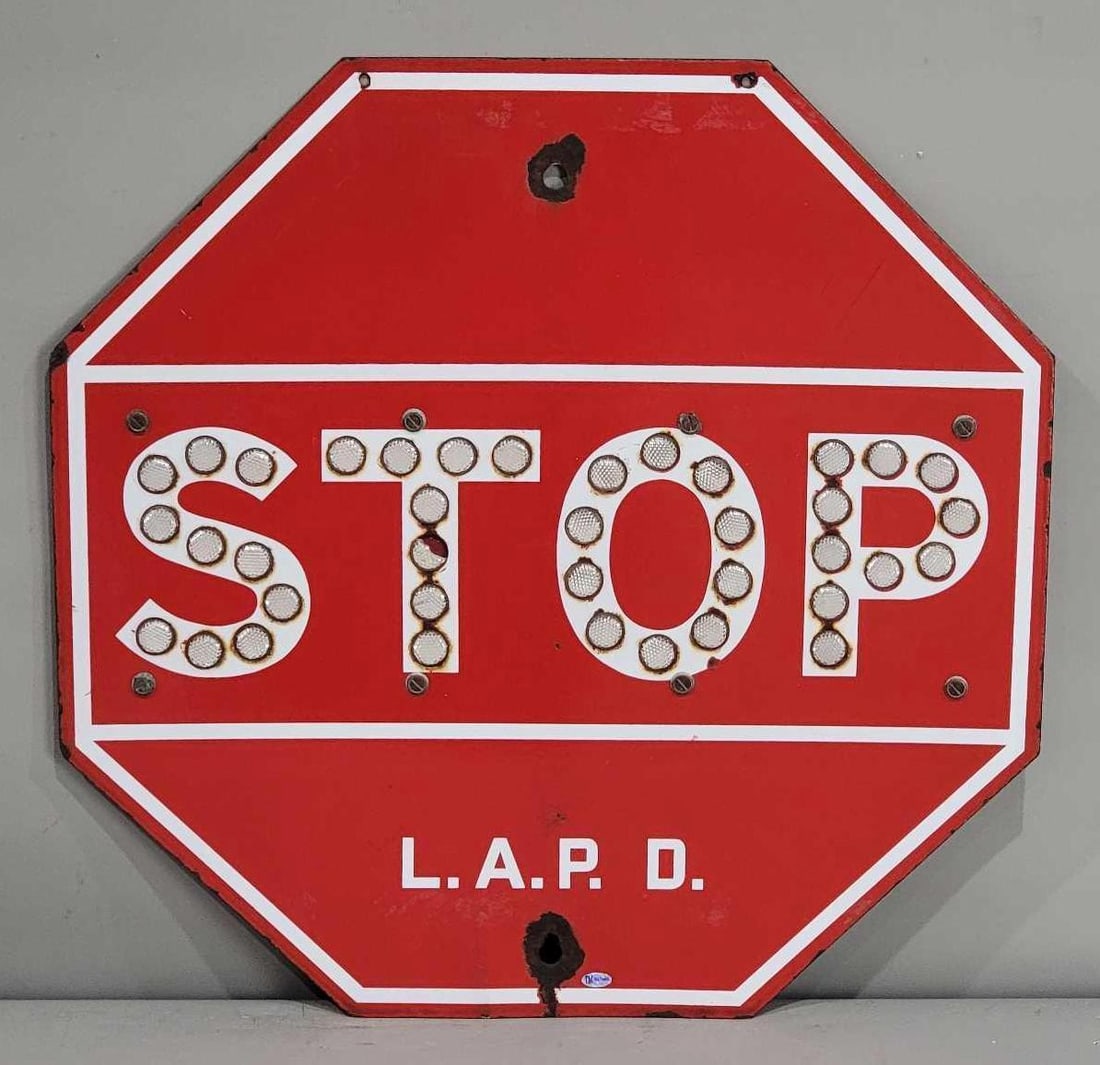 L.A.P.D. Stop Porcelain Sign w/Plastic Reflectors (TAC): rated 8.5, 24"x24", the SSP sign has good color and gloss, has wear and a tiny chips. Rarity 2. TAC #032489