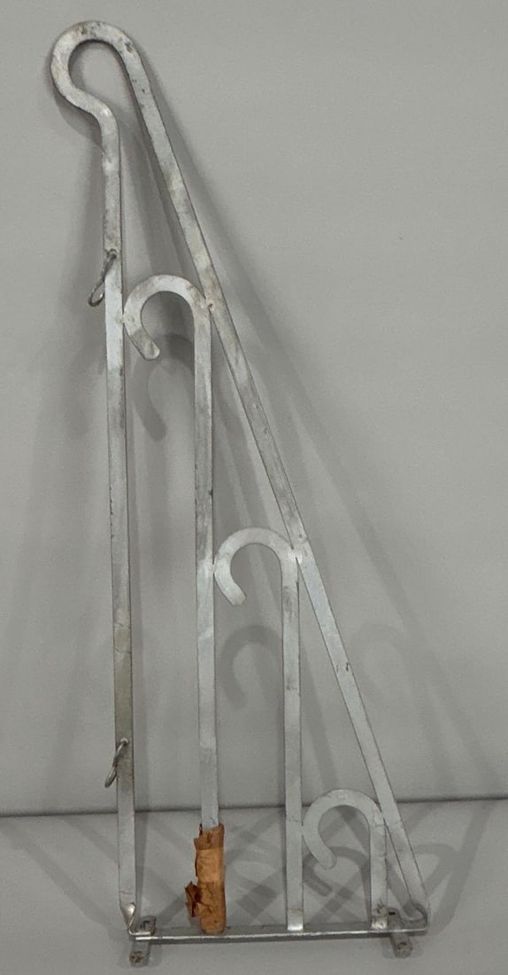 Original Metal Sign Hanger: 26"L., the holes are 13.5" on centers.