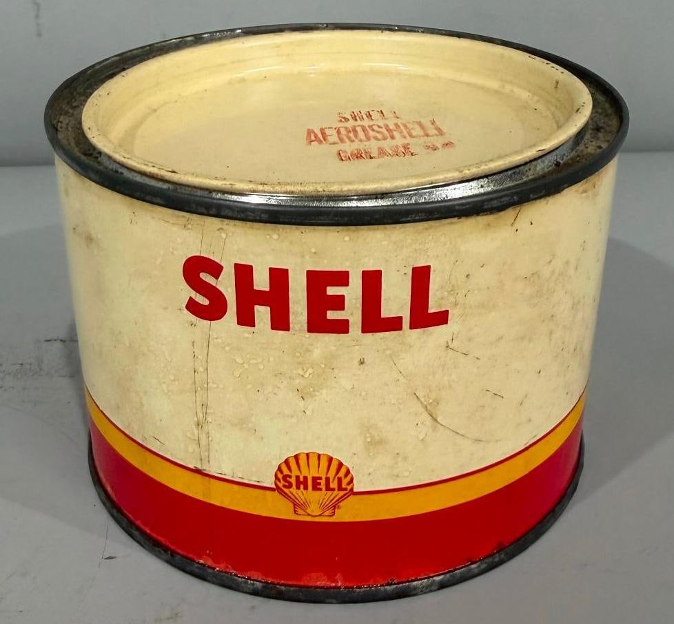 Shell w/ Sharktooth Logo Metal Grease Can: rate 8, the one pound metal grease can has good color and shine, shows some soiling
