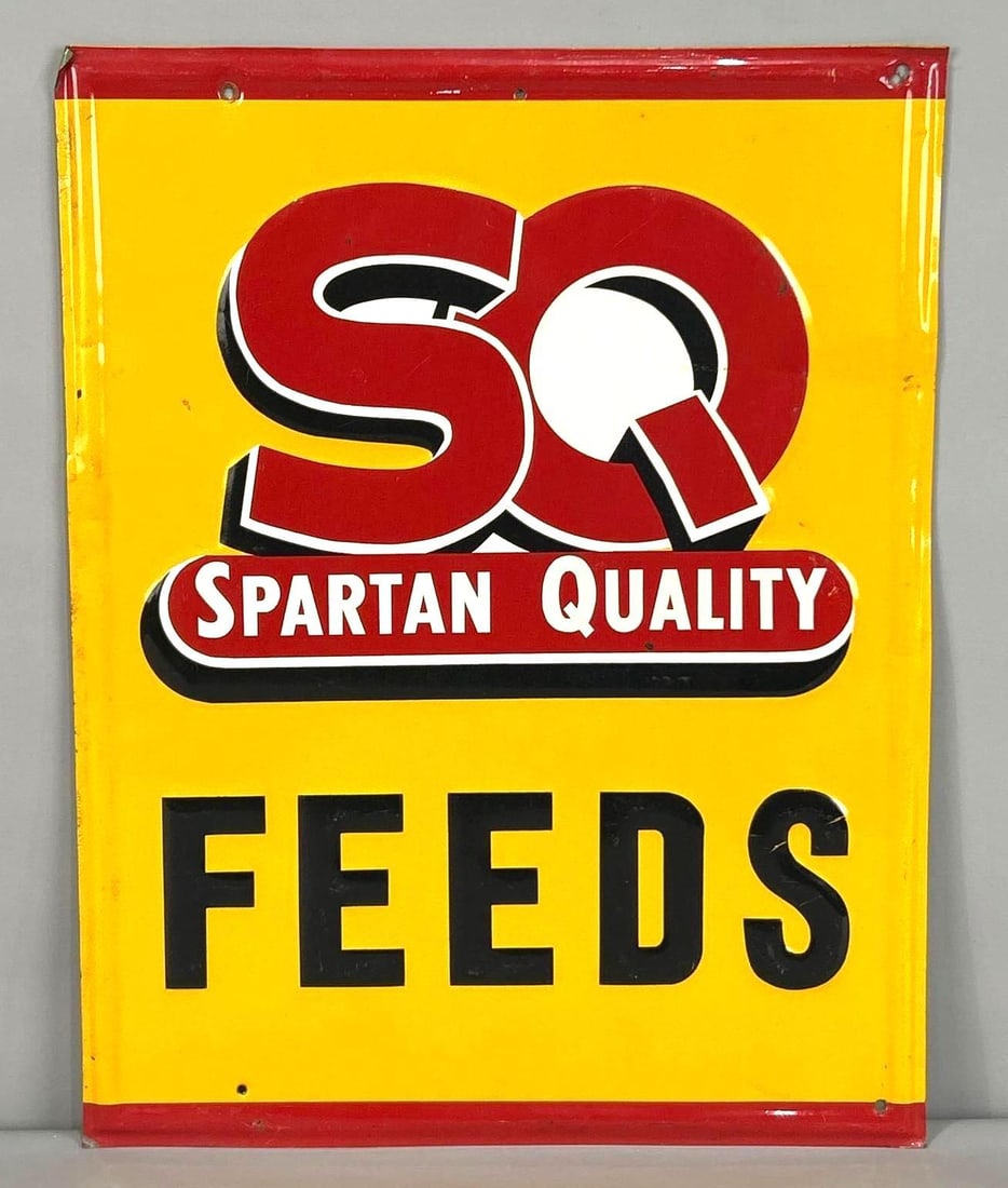 Spartan Quality Feeds Self-Framed Embossed Tin SIgn: (Rated 8.25). 14.25" x 18". This SST sign has good color and gloss throughout. Sign shows minor bends and holes in the frame. Rarity 2. TAC # 062290. 
