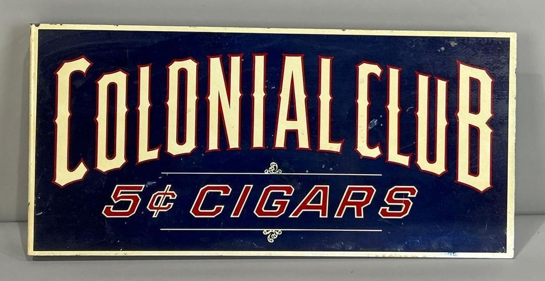 Colonial Club 5¢ Cigars Painted Metal Flange Sign: (Rated 7.5, Flaking). 9" x 18.5". This DST flange sign has fair color throughout. Display shows staining and surface blemishes. Reverse side paint is flaking. Rarity 2. 