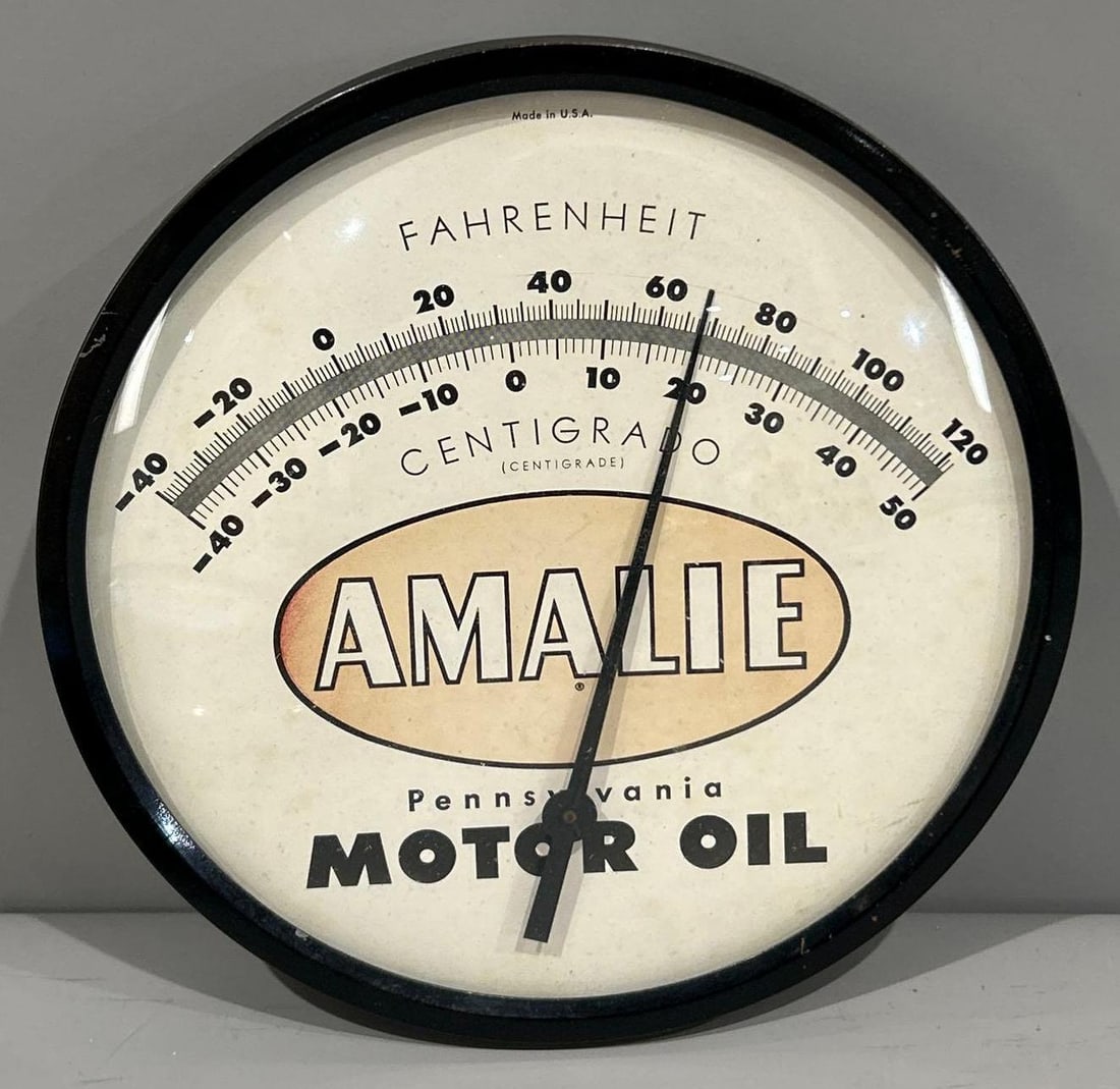 Amaile Motor Oil Round Metal Thermometer: rated 7, 9"D., the round metal thermometer is faded, works. 