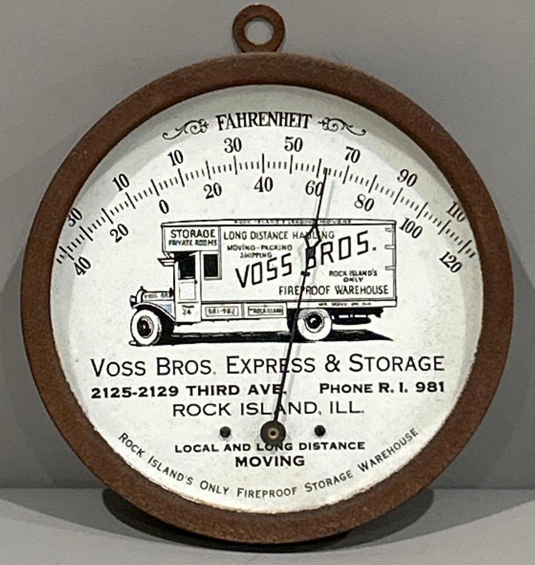 Voss Bros. Express & Storage w/Truck Round Metal Thermometer: rated 8, 6"D., the face is clean, metal ring is rusty.