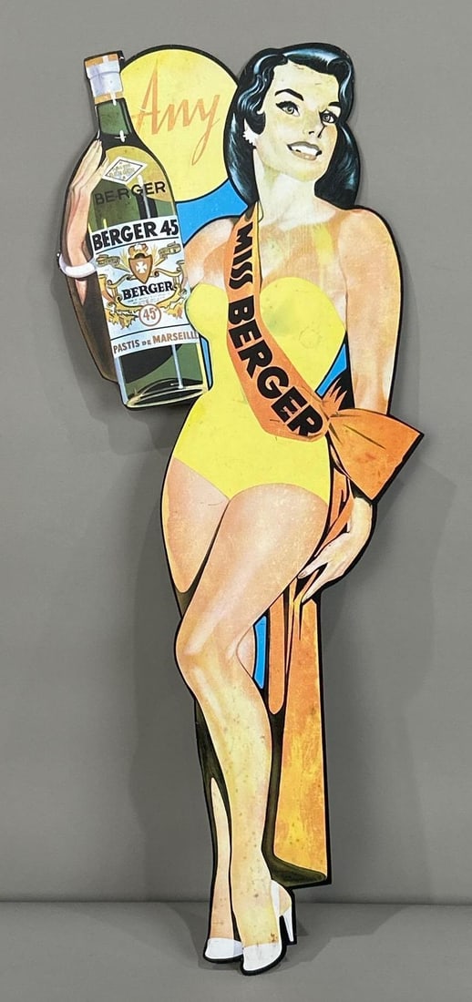 Miss Berger Die-Cut Tin Pin Up Girl Sign: Rated 7.9. 6.5" x 18". This SST sign has significant fade throughout, as well as, other scratches with paint loss and surface staining. Rarity 3. TAC #062050.