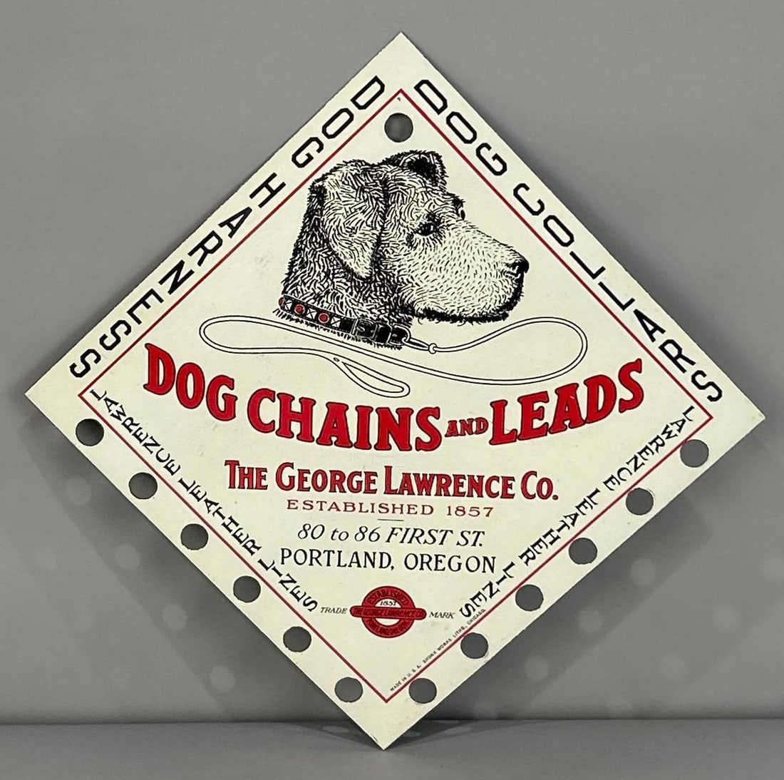Dog Chains And Leads Metal Sign W/ Dog Graphic: Rated 9.5. 7.25" x 7.25". This SST sign has great color and gloss with only light swirled surface scratches serving as the only detraction. Marked, "Shonk." Rarity 2. TAC # 061931.