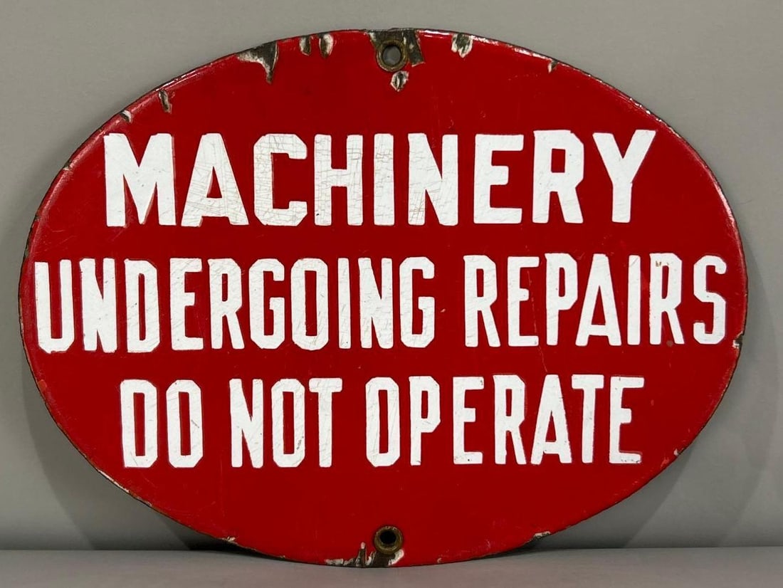 Machinery Repair Porcelain Sign: Rated 8.9. 8" dia. This SSP sign has significant crazing and surface scratching throughout. Outer edge has notable porcelain loss. Rarity 4. TAC # 062001