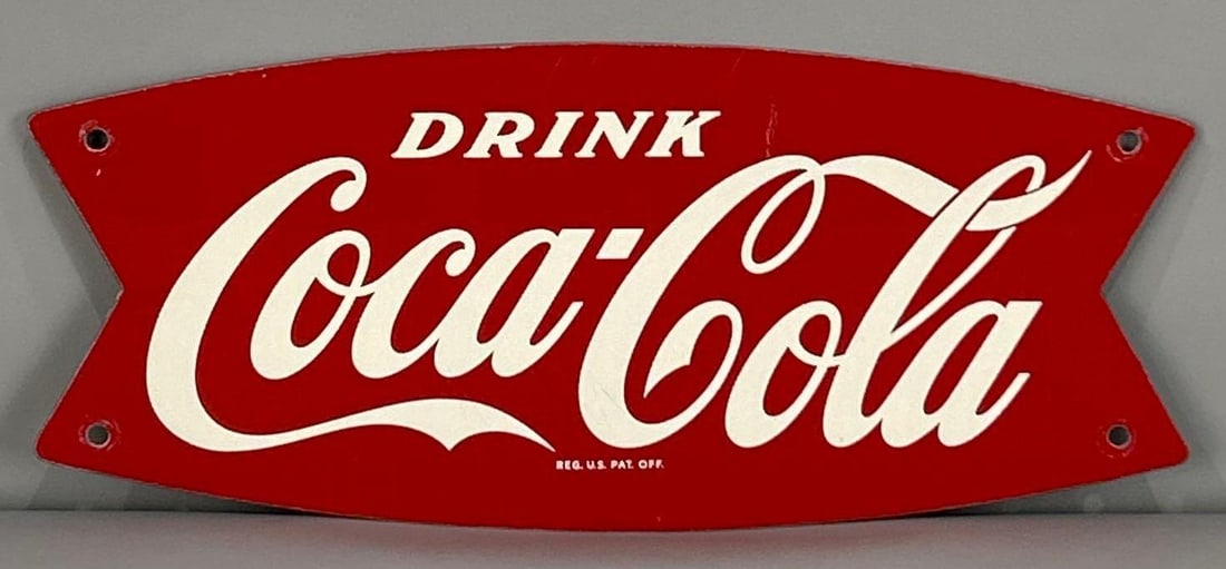 Drink Coca-Cola Painted Metal Fishtail Sign: Rated 9.0. 5.5" x 12". This SST sign has good color and gloss with surface scratches on the outer field and at the hanging holes. Rarity 2. TAC #062040