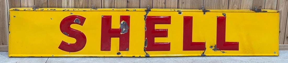 Shell Porcelain Sign (TAC): rated 7.75, 20"x116" the SSP embossed rolled edge sign has good color and gloss, has large chips in the field. Rarity 5. TAC #063775