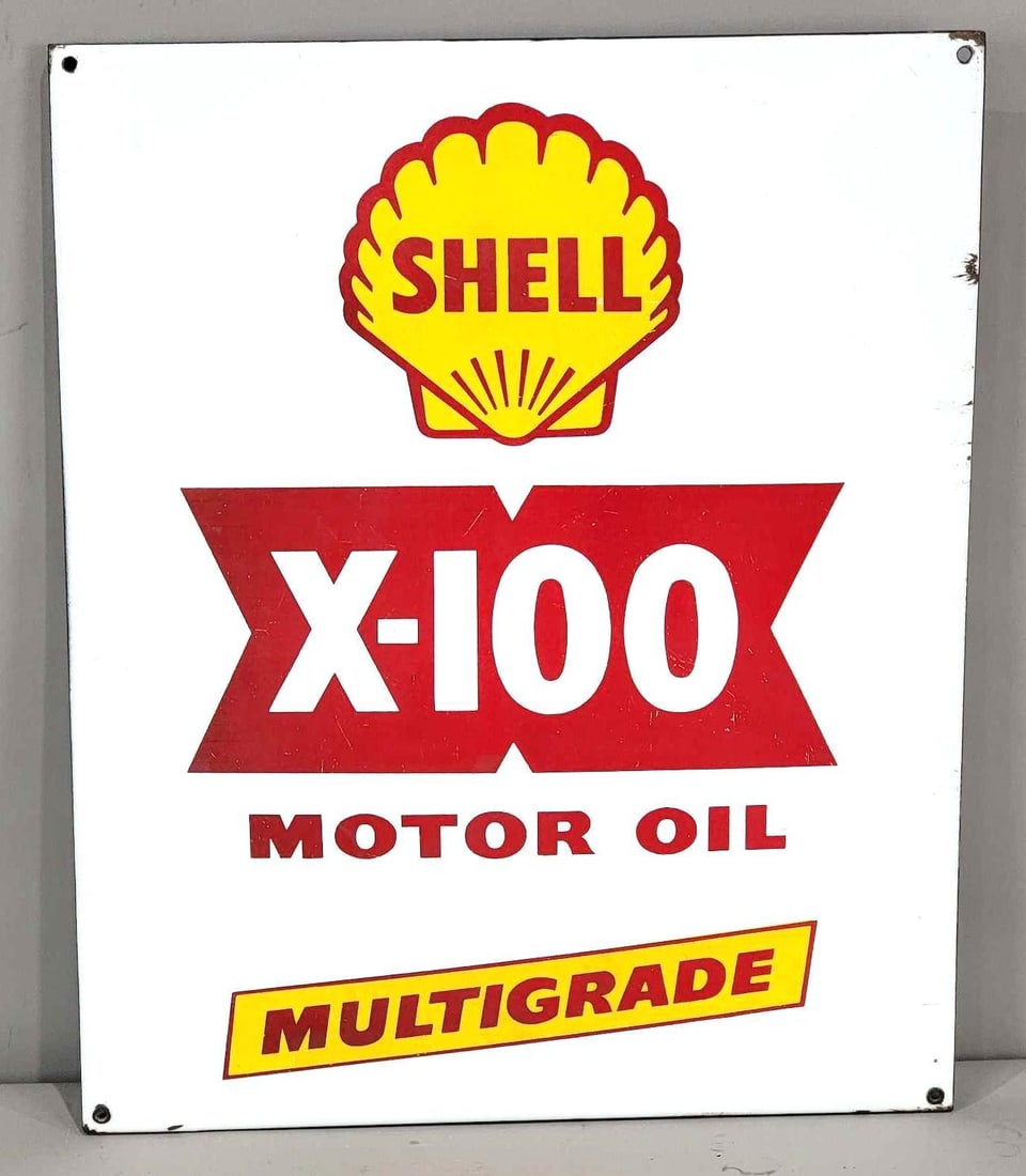 Shell X-100 Motor Oil Multigrade w/Logo Porcelain Sign (TAC): rated 8.5, 22.5"x18.5", the SSP rolled edge sign has good color and gloss, has wear and fine scratches in the field, small chips around the perirmeter. Rarity 4. TAC #063224