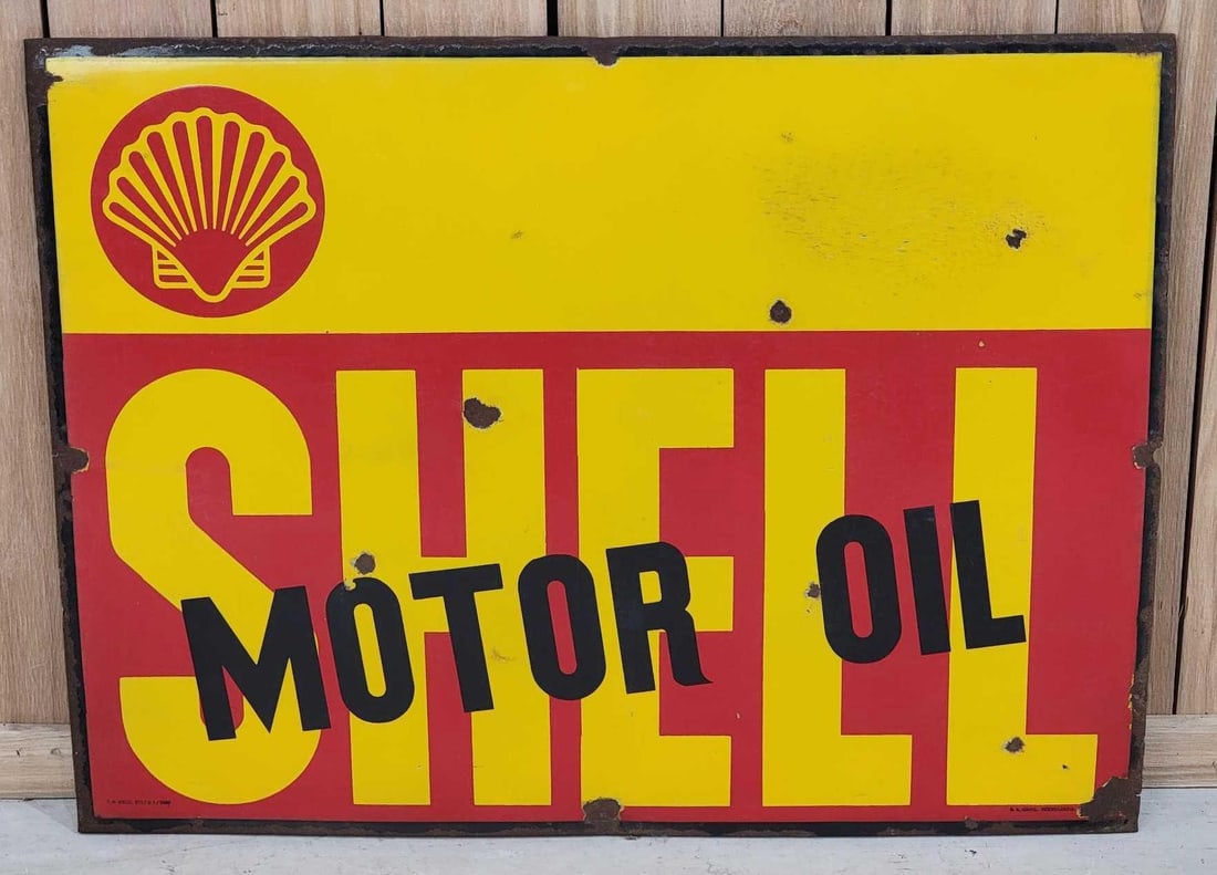 Shell Motor Oil w/Logo Porcelain Sign (TAC): rated 7.5, 28.75"x37.25", the SSP rolled edge sign has good color and some gloss, has chips, wear and stained area in the field, has chips and rust around the perimeter, metal loss, marked. Rarity 3.