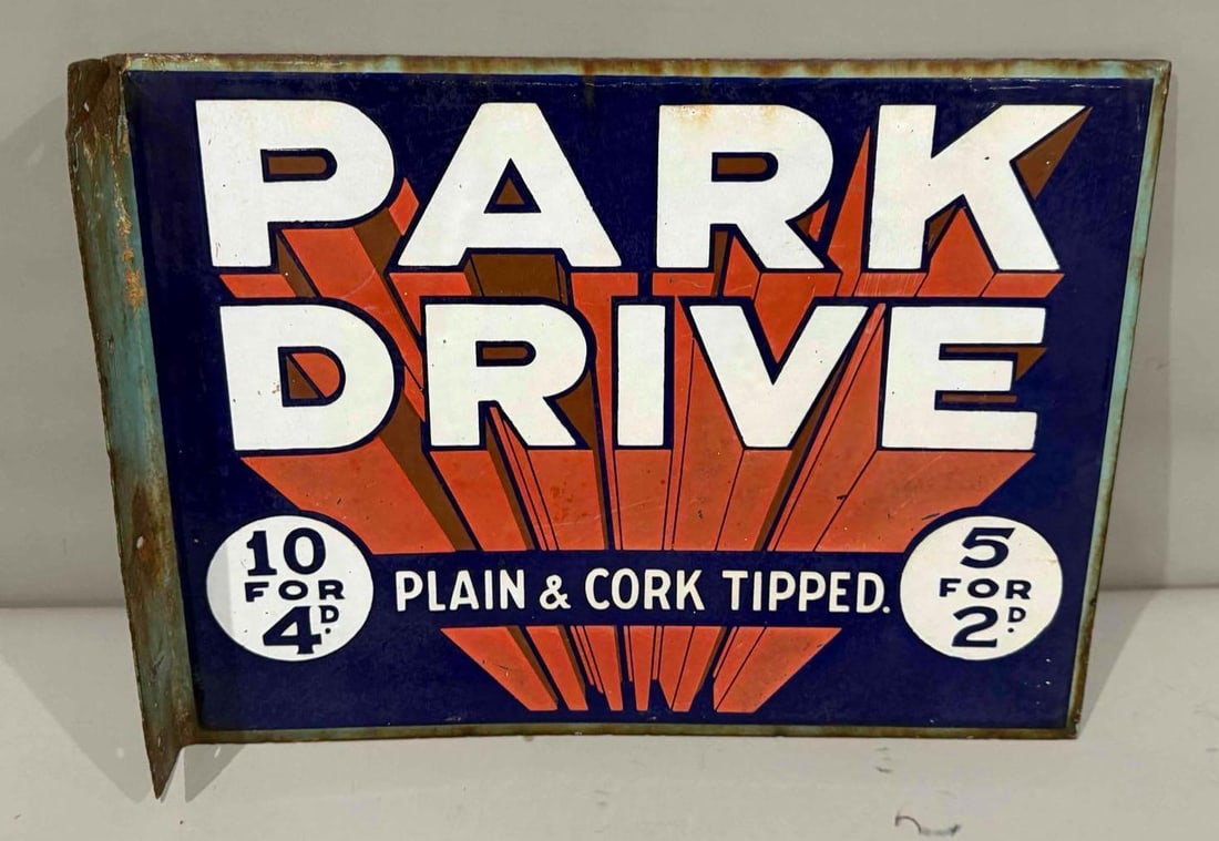 Park Drive and Condor Twist Cigars Porcelain Flange Sign: (Rated 8.9, 7.9). 12" x 16.25". This DSP sign has good color and shine throughout both sides. Display shows surface staining in the field and on the outer edge. Reverse shows discolorization and 