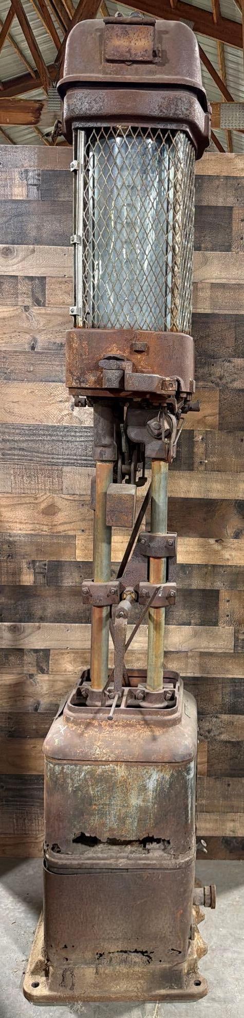 St. Louis Model #402 Five Gallon Visible Gas Pump: in as found original condition, glass cylinder is in good condition, missing it's center skins, bottom skins have rust holes. 