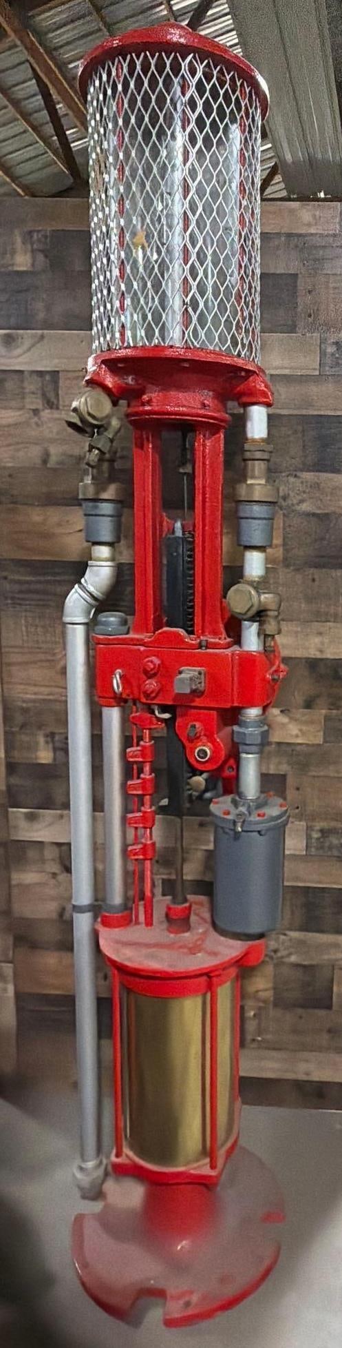 Rare American Model #D.U. 2nd Version Five Gallon Visible Gas Pump: the gas pump has been restored but does have semi-rough casting, glass cylinder is good, the original brass tag says Model #26270. Rare pump to find.