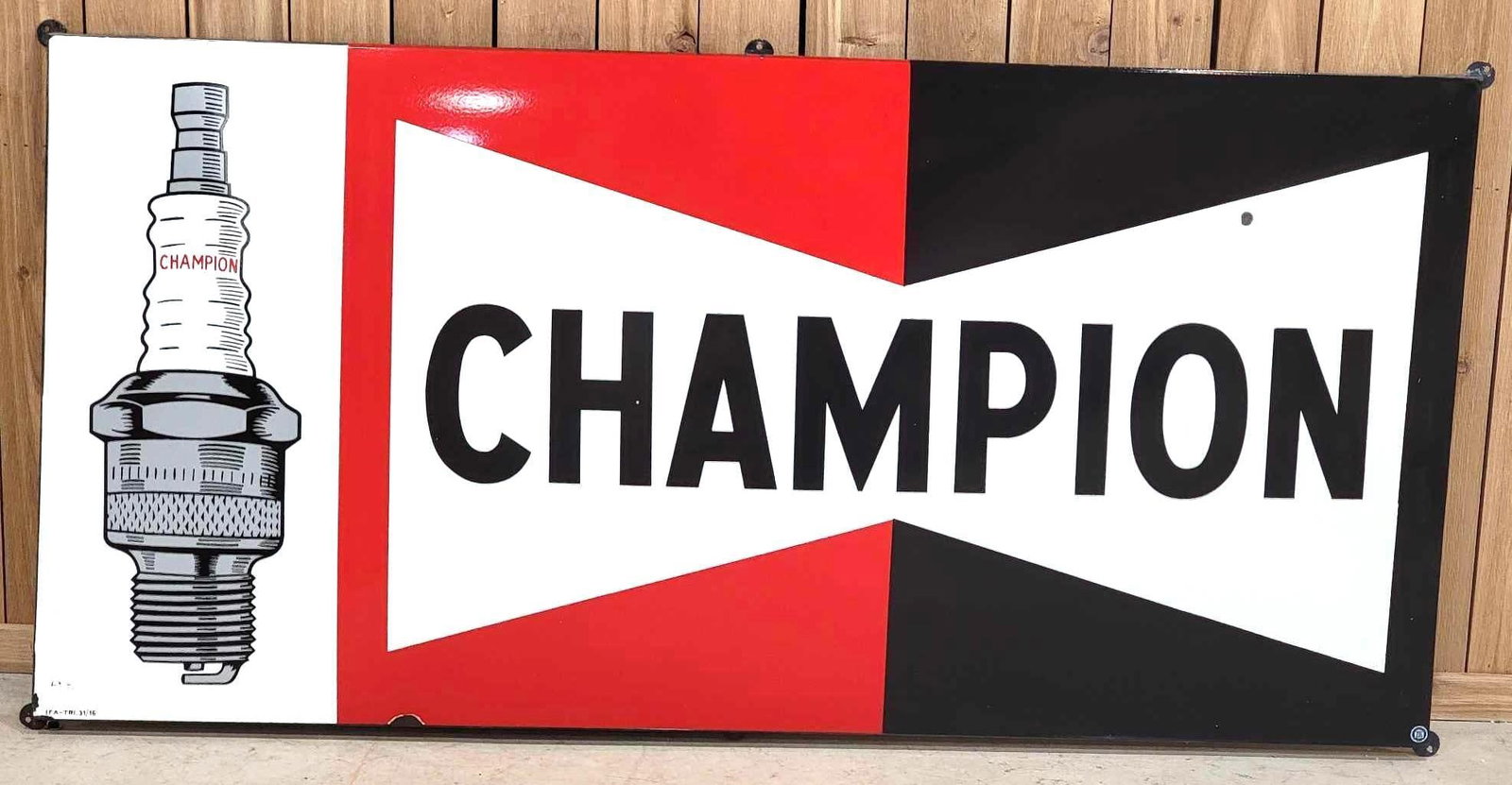Large Champion Spark Plug Porcelain Sign (TAC(): rated 9c, 37.5"x77.25", the SSP rolled edge sign has excellent color and gloss, field is clean, has dime size chip in the left-hand field, has a slight twist, straighten out when screwed to the