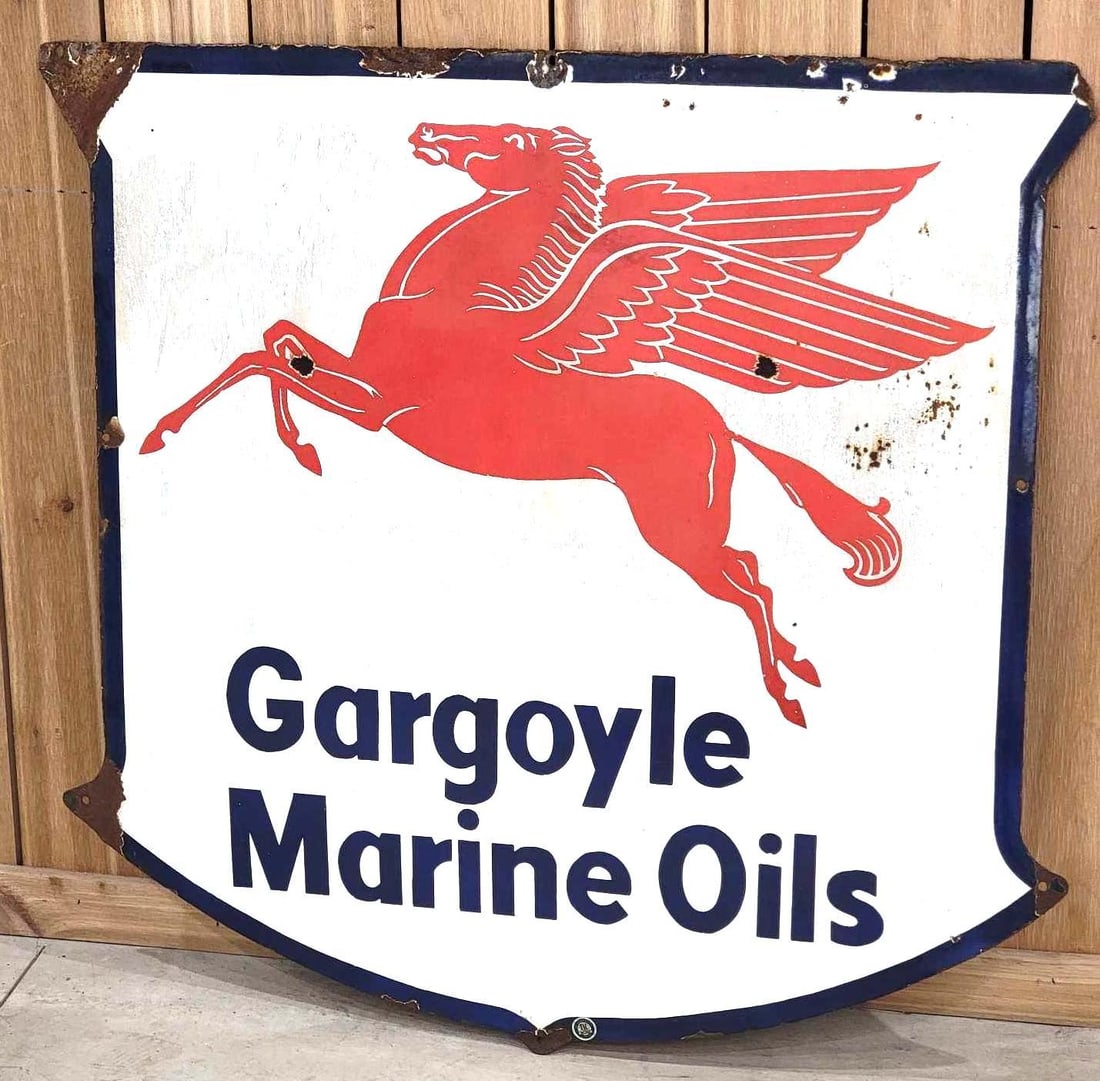 38" Gargoyle Marine Oils w/Pegasus Porcelain Sign (TAC): rated 7, 37.5"x38.5", the SSP shield-shaped sign has good color and some gloss, has small chips, staining and rust in the upper field, has large chips along the top edge. Rarity 5. TAC #063222
