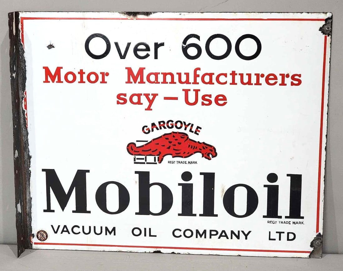 Over 600 Motor Manufactures Say Use Mobiloil Porcelain Flange Sign (TAC): rated 8.25, 16"x20", the porcelain flange sign has good color and gloss, a few small bruises in the field, has two small nail holes at outer edge, flange has chips. TAC #063243