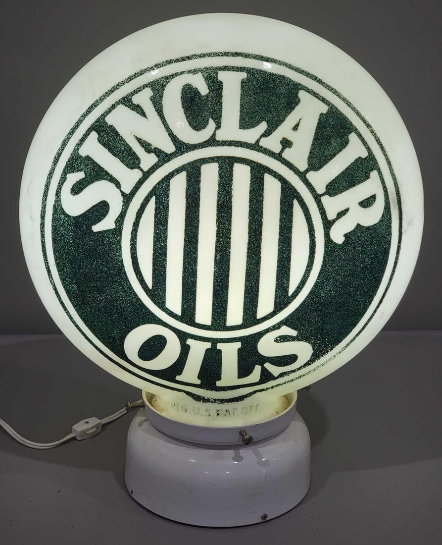 Sinclair Oils w/Jail-Bar Logo OPE Milk Glass Globe (TAC): rated 8.9, the 16.5"T., OPE (one-piece etched) milk glass globe body, paint has good color, has some wear, base is good. TAC #025244