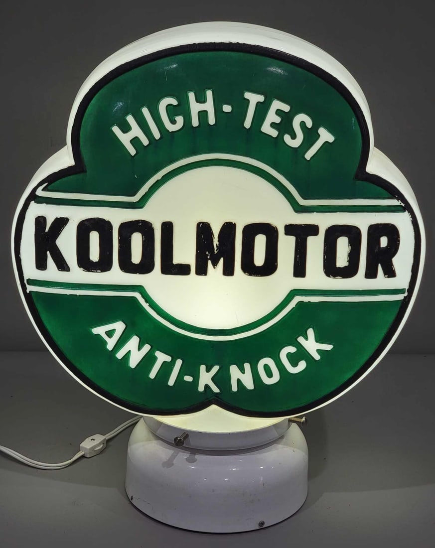Koolmotor High-Test Anti-Knock OPC Milk Glass Globe (TAC): rated 9, 16.5"T., the OPC clover-shaped milk glass globe in good condition, has minor paint wear, has a large chips on the base.TAC #025285