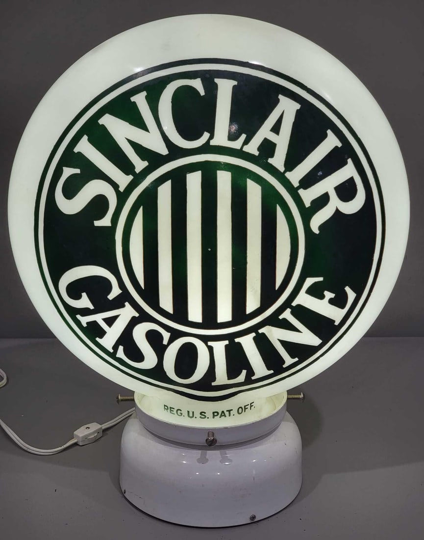 Sinclair Gasoline w/Jail-Bar Logo OPB Milk Glass Globe (TAC): rated 8.5 to 9, 16.5"T., the OPB (one-piece baked) milk glass globe, has good color, has light wear, has several chips around the base. TAC #025247