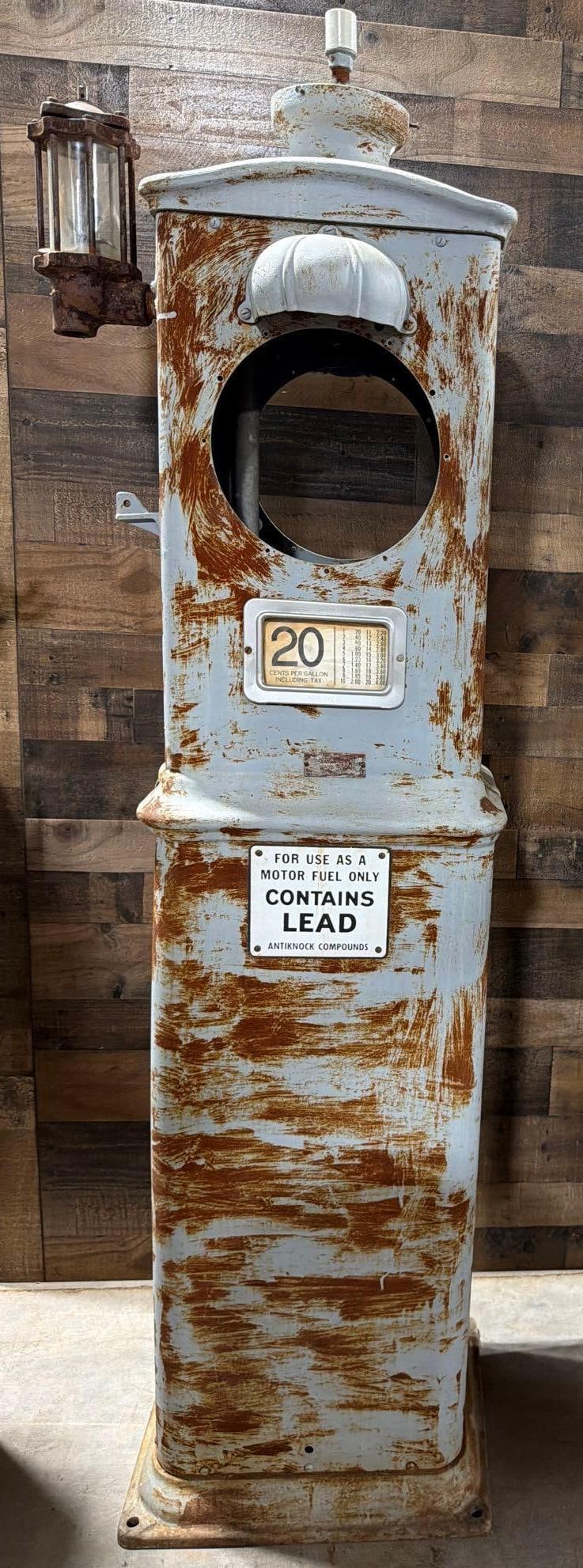 American Model #277 Clock-Face Gas Pump: in as ground condition, old silver paint, is missing it's clock mechanism, has it's pump and spinner gauge, sheet metal is straight and in good condition. 