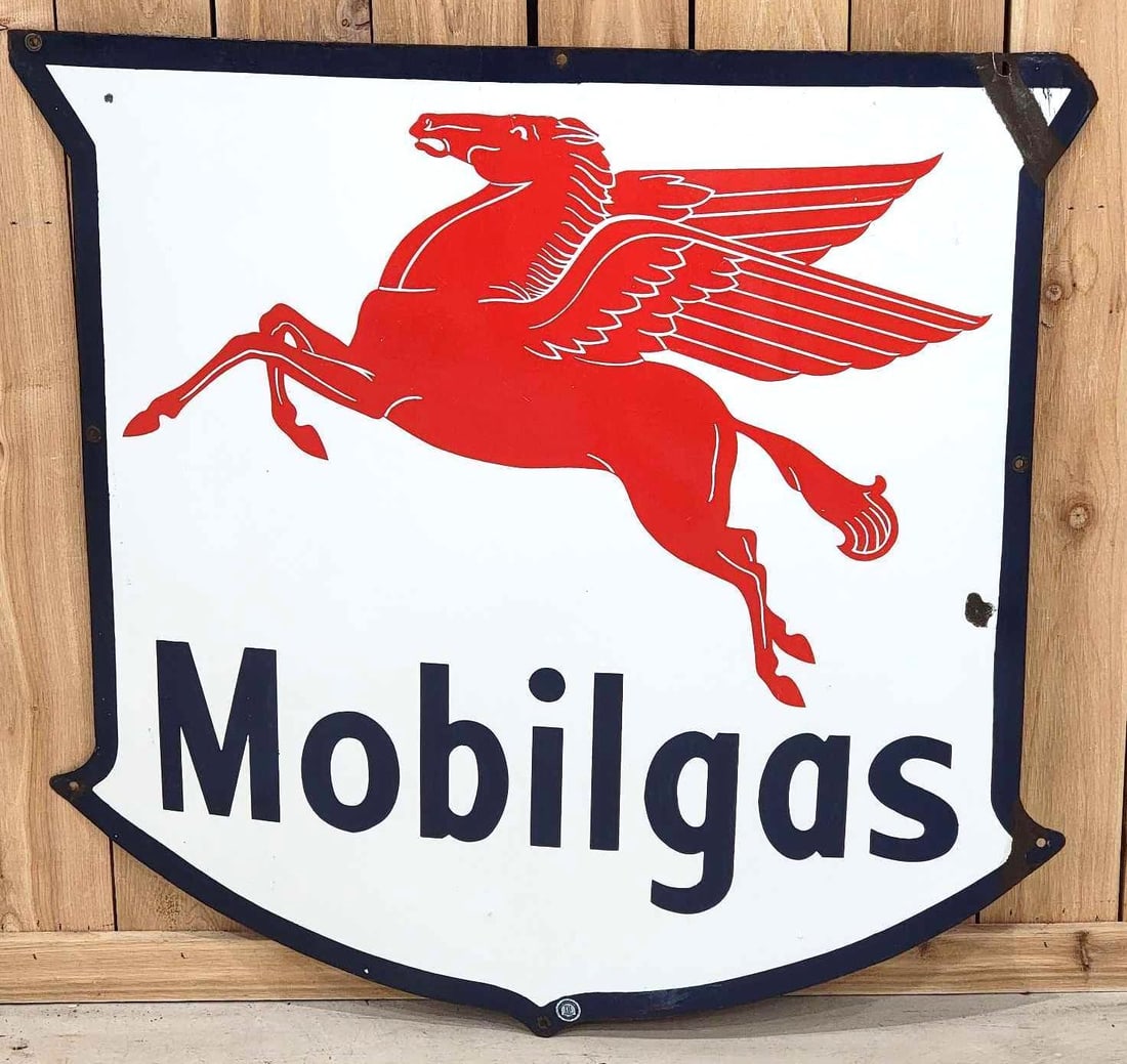 38" Mobilgas w/Pegasus Porcelain Sign (TAC): rated 8.25, 38"x39", the SSP shield-shaped sign has excellent color and gloss, field is clean, both points on the right-hand side have been folded, other chips around the outer field and perimeter, ma