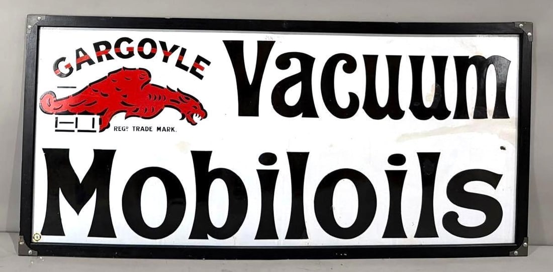 Gargoyle Vacuum Mobiloils Porcelain Sign (TAC): rated 8, 24"x52", the SSP sign has good color and gloss, has touched up chip in the field and touched up cease at the right-hand field. Rarity 9. TAC #063828