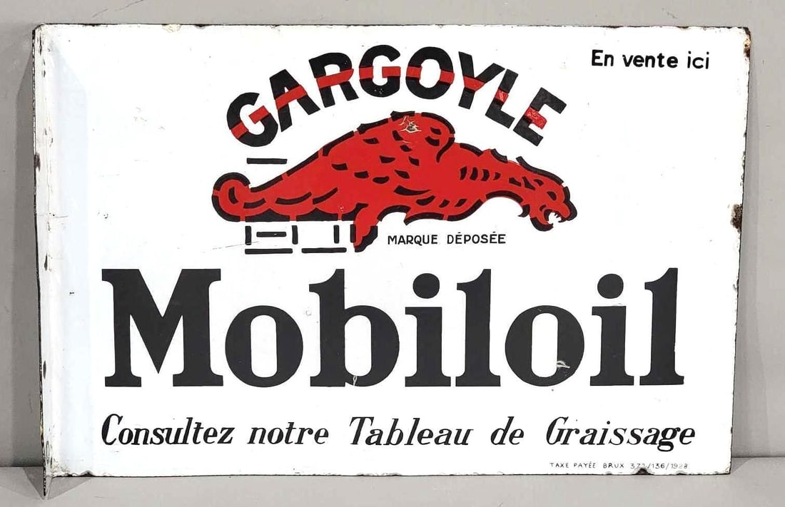 Mobiloil Gargoyle Porcelain Flange Sign (TAC): rated 8.5 & 8, 15.75"x23.75", the porcelain flange sign has good color and gloss, display has a few tiny chips, reverse has wear and chips, marked Taxe Payee, dated 1928. Rarity 2. TAC #063273