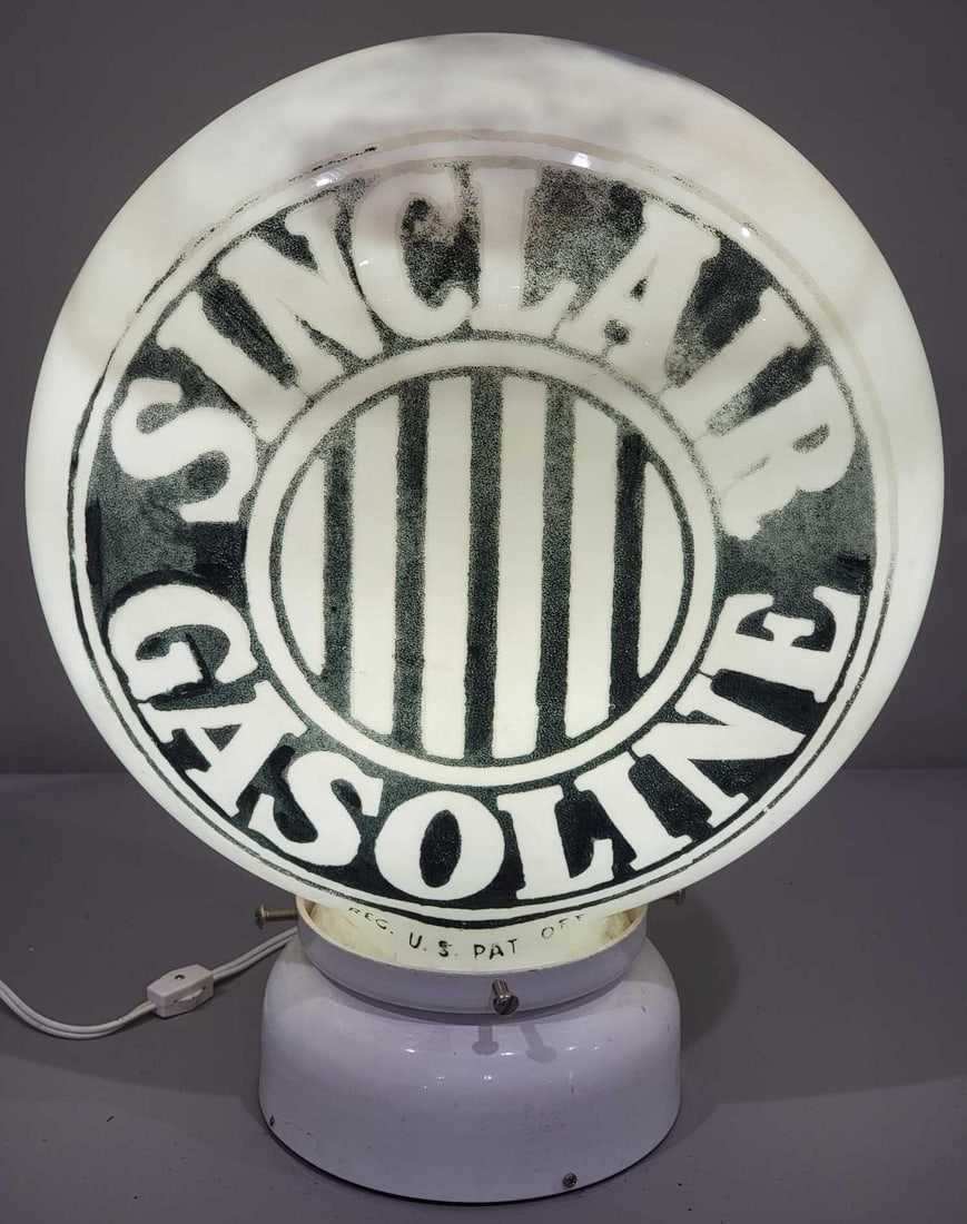Sinclair Gasoline w/Jail-Bar Logo OPE Milk Glass Globe (TAC): rated 8 to 8.5, 16.5"T. the OPE (one-piece etched) milk glass globe, body in good condition, small chips around the base, has paint wear. TAC #025248