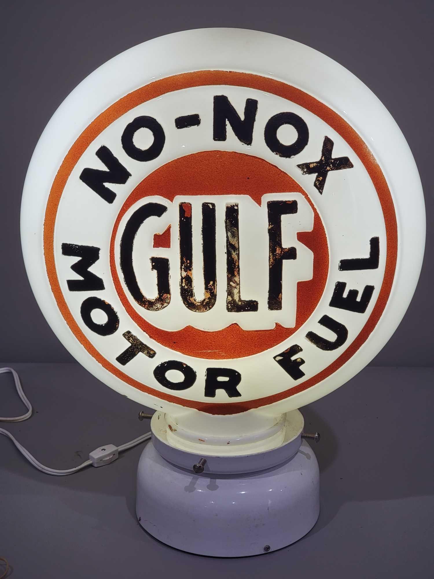 Gulf No-Nox Motor Fuel OPC Milk Glass Globe (TAC): rated 8.5, 17"T., the OPC (one-piece cast) milk glass globe has some paint wear to letters, body is good and has a screw base, no collar. TAC #025279