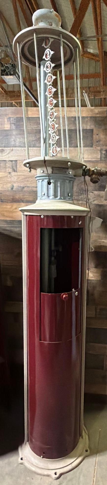 American Model #240-V Ten Gallon Visible Gas Pump: the gas pump has been restored, has wear and fine scratches, comes with clear glass cylinder with two bb hits, the door does slide. See photos.
