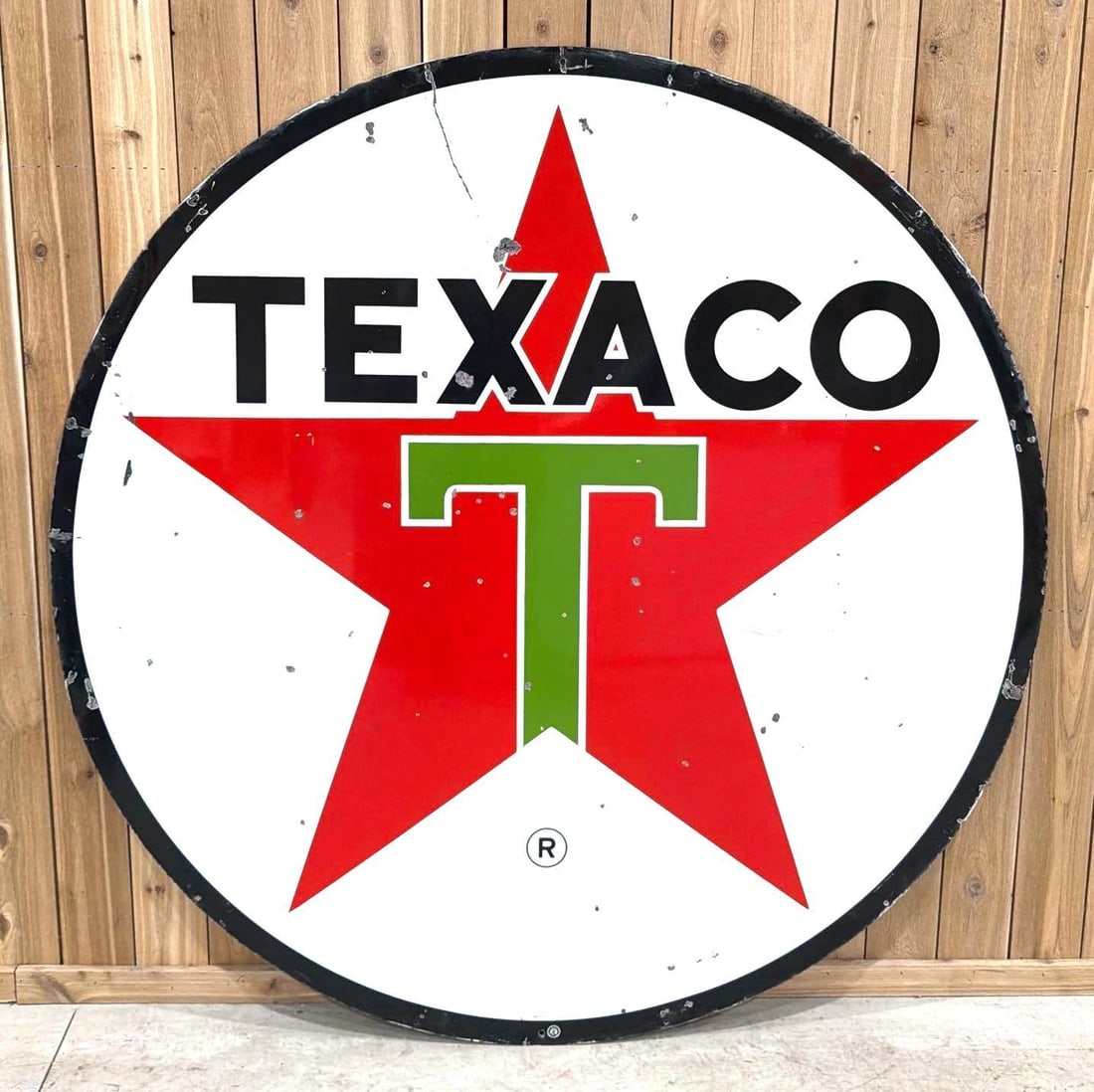 Texaco (white-T) Star Logo Porcelain Identification Sign (TAC): rated 7.5, 72"D., the DSP sign has good color and some gloss, has numerous chips, wear and one hole in the fields, dated 1960. Rarity 2. TAC #063859