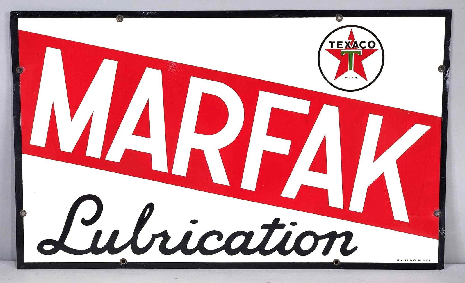 Texaco (white-T) Marfak Lubrication Metal Sign (TAC): rated 9, 18"x30", the SST sign has excellent color and shine, field is clean, has light wear around the perimeter, dated 1946. Rarity 3. TAC #063219