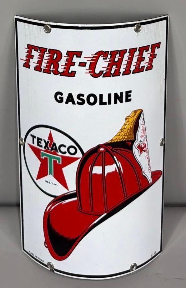 Texaco (white-T) Fire Chief Gasoline Porcelain Small Curved Sign (TAC): rated 9, 12"x8", the SSP curved sign, has very good color and gloss, field is clean, has stress lines in the upper right-hand corner, dated 1942. Rarity 3. TAC #063682