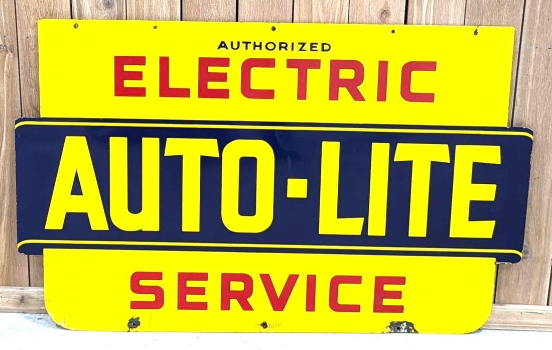 Authorized Auto-Lite Service Porcelain Sign (TAC): rated 9, 33.5"x52.75", the DSP diecut sign has excellent color and gloss, display field is clean, has chips around the perimeter, reverse has minor rust staining, marked Walker & Co. Detroit. Rarity 6