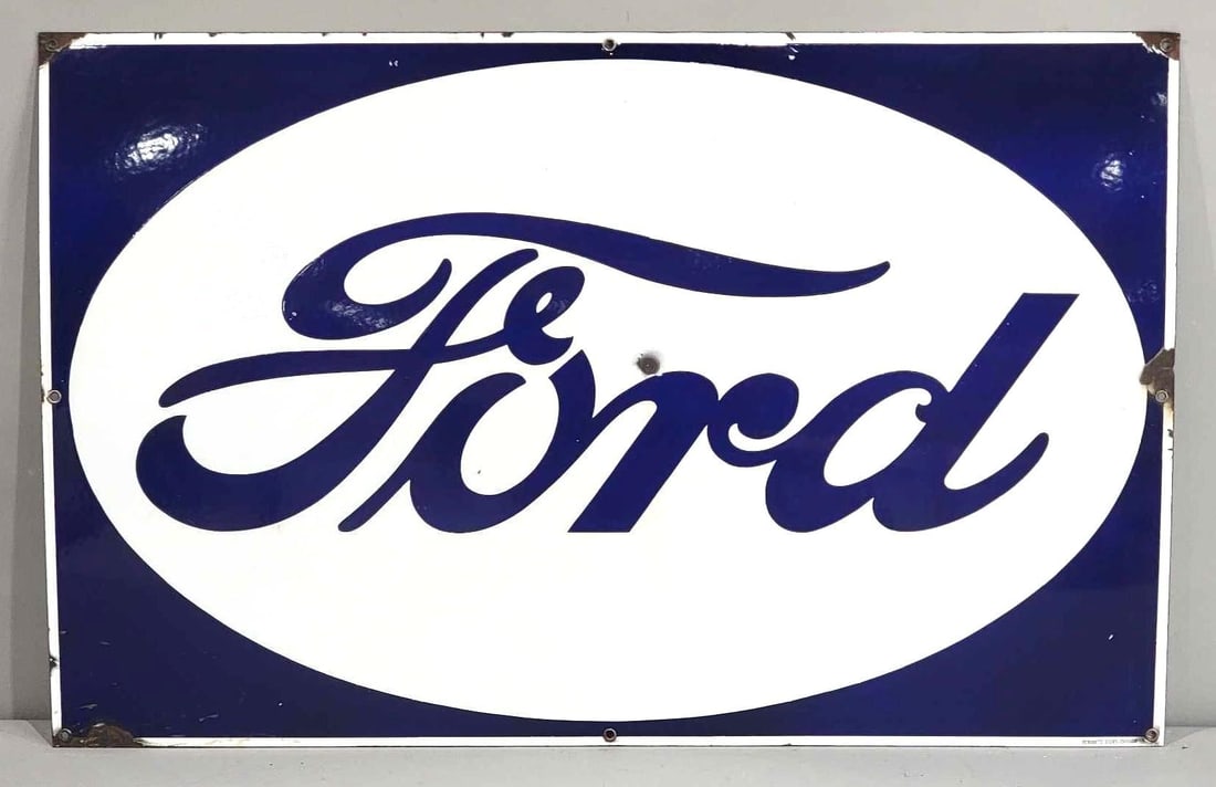 Ford Reverse Colors Porcelain Sign (TAC): rated 8.75, 25"x39", the SSP sign has excellent color and gloss, has a dime size chip in the field, has chips around the perimeter, marked Veribrite. Rarity 4. TAC #063361