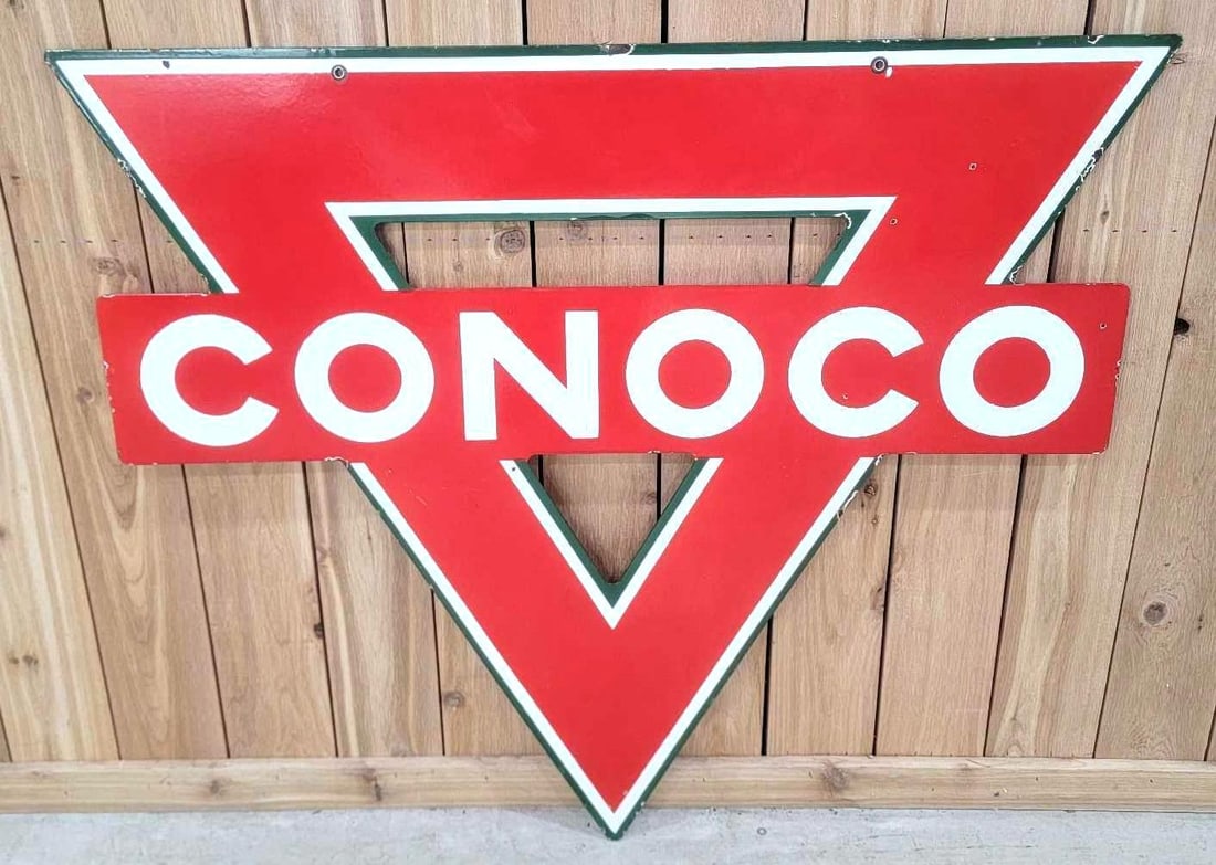 Conoco (gasoline) Porcelain Triangle Sign (TAC): rated 8.9, 39"x45", the DSP die-cut pierced sign has excellent color and gloss, has a few tiny chips in the fields and around the perimeter, marked Property of the Continental Oil Co. Rartiy 3. TAC