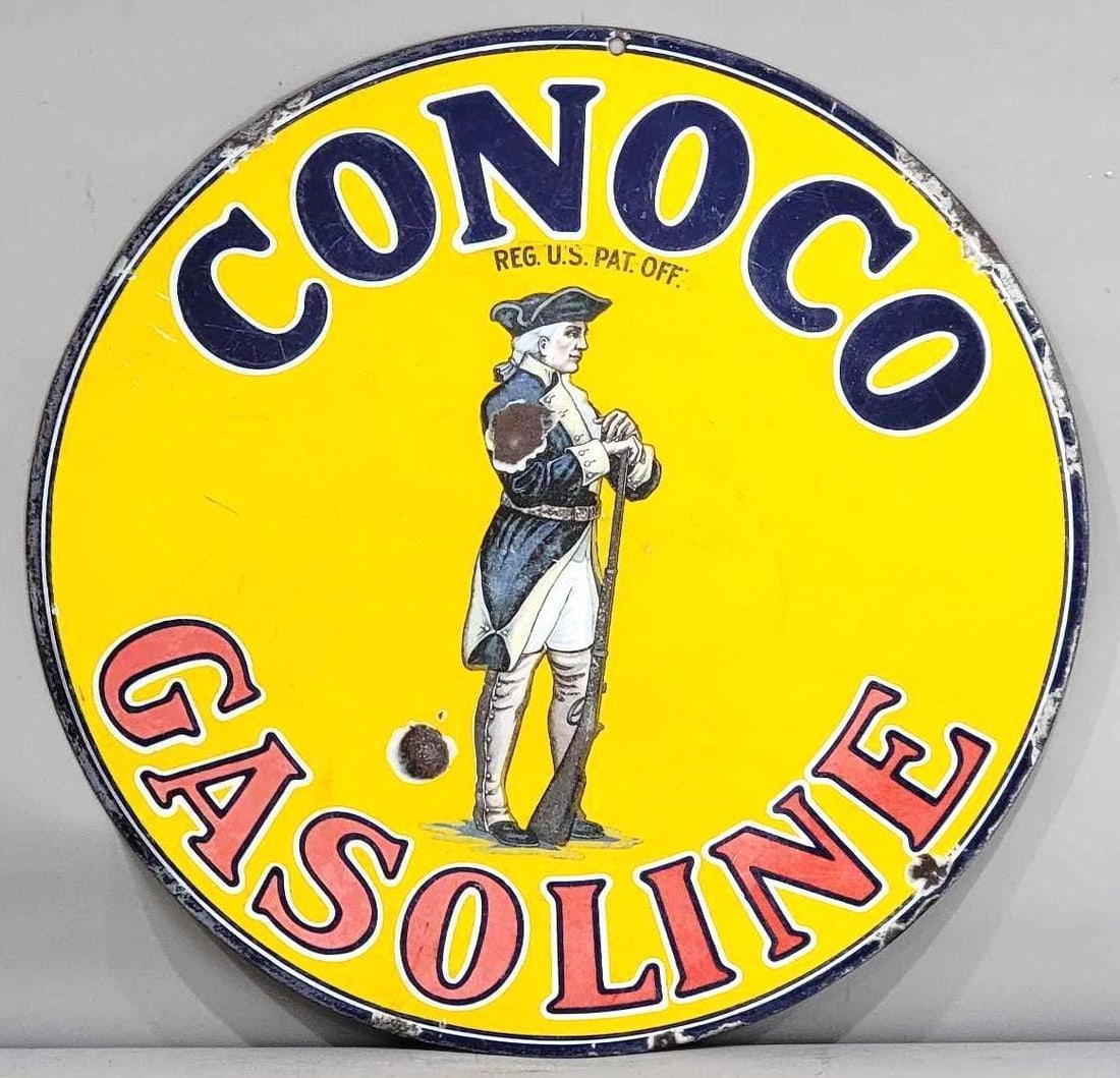 Conoco Gasoline w/Soldier Image Porcelain Sign (TAC): rated 7.5, 25.5"D., the DSP sign has good color and some gloss, has wear and chips in the field and around the perimeter. Rarity 5. TAC #032485