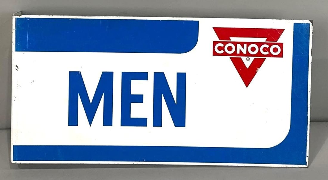 Conoco Men's Room Flange Sign W/ Logo Graphic: Rated 8.9, 8.75. 5" x 10". This DST flange sign has good color and gloss with surface staining and scratching on both sides. Reverse side shows heavier scratching. Rarity 2. TAC # 062069.