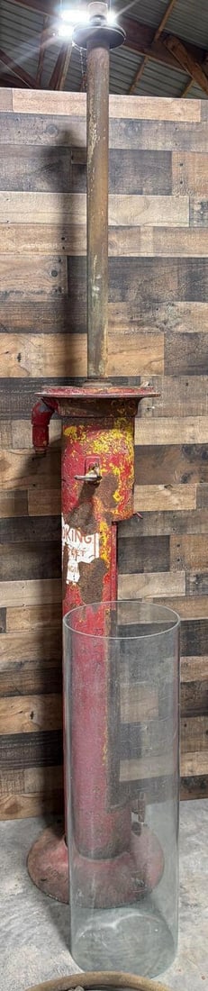 Ottawa "Stove Pipe" Fifteen Gallon Visible Gas Pump: is an old repaint, has a good glass cylinder, top pieces, cast top is repaired, missing base and side cover. See photos.