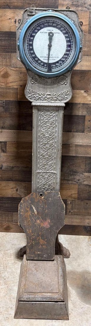National Novelty Co. Coin-Operated Scale: 68"T., the cast iron scale has been over painted, works, no key.