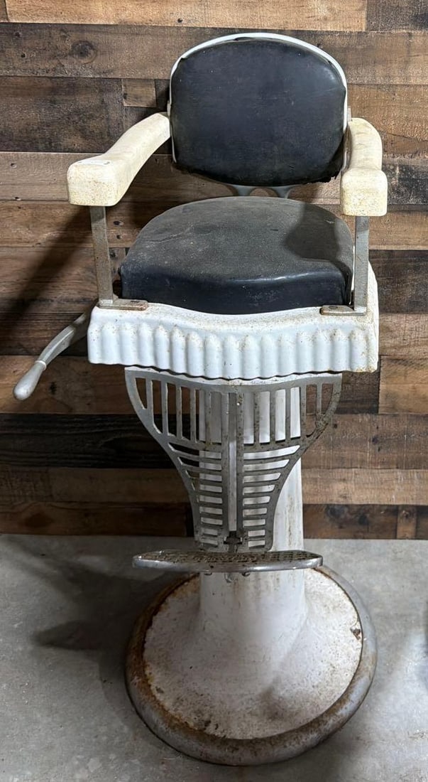 Emil J. Paidar Child's Barber Chair: in fair to good condition, porcelain is in good condition, metal parts have some rust. Chair works.