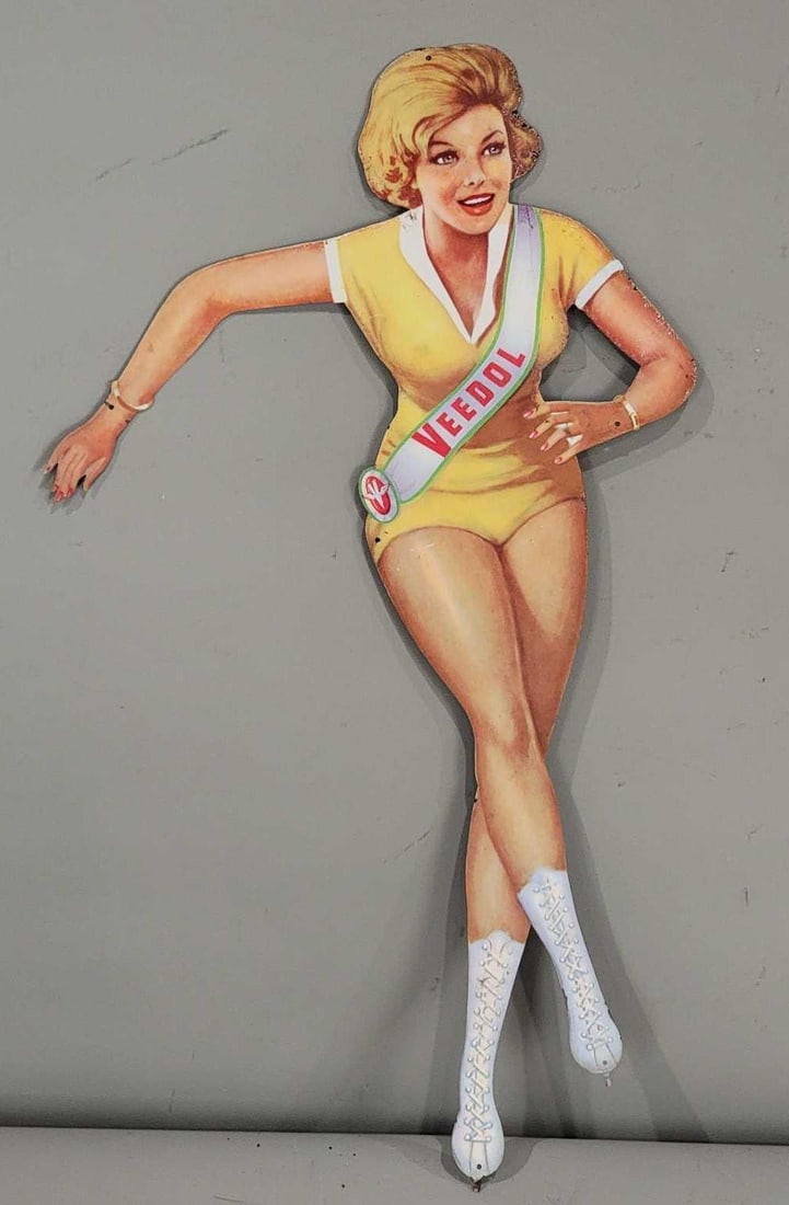 Veedol Skating Girl (short hair) Metal Sign (TAC): rated 9, 17"x9.5", the SST die-cut sign has very good color and shine, light wear. Rarity 2. TAC #063281