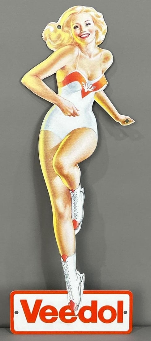 Veedol Die-Cut Painted Metal Sign: Rated 9.75. 5.5" x 14". This single sided aluminum sign has perfect color and gloss with one minor surface stain under the second "e" in Veedol. Rarity 4. TAC # 061893.