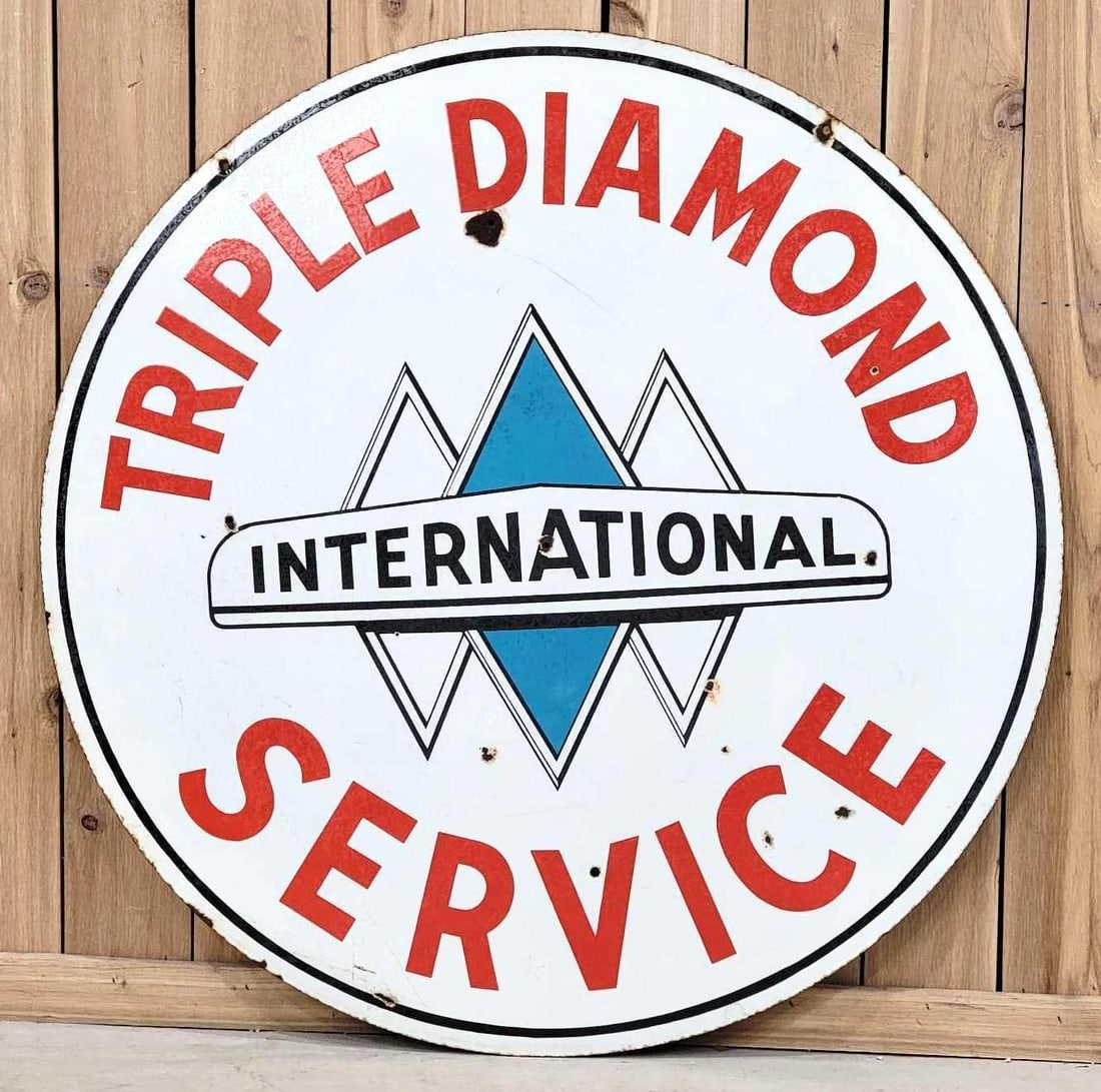 International Triple Diamond Service w/Logo Porcelain Sign (TAC): rated 7.5, 42"D., the DSP sign has good color and some gloss, has wear, fine scratches and five holes drilled in the field. Rarity 7. TAC #063318