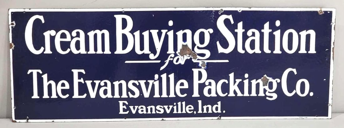 Cream Buying Station "The Evansville Packing Co" Porcelain Sign (TAC): rated 8.25, 15"x42", the DSP sign has good color and gloss, has chips and wear in the center of the field, chips around the perimeter, marked Nesco Signs N.Y. Rarity 8. TAC #032474