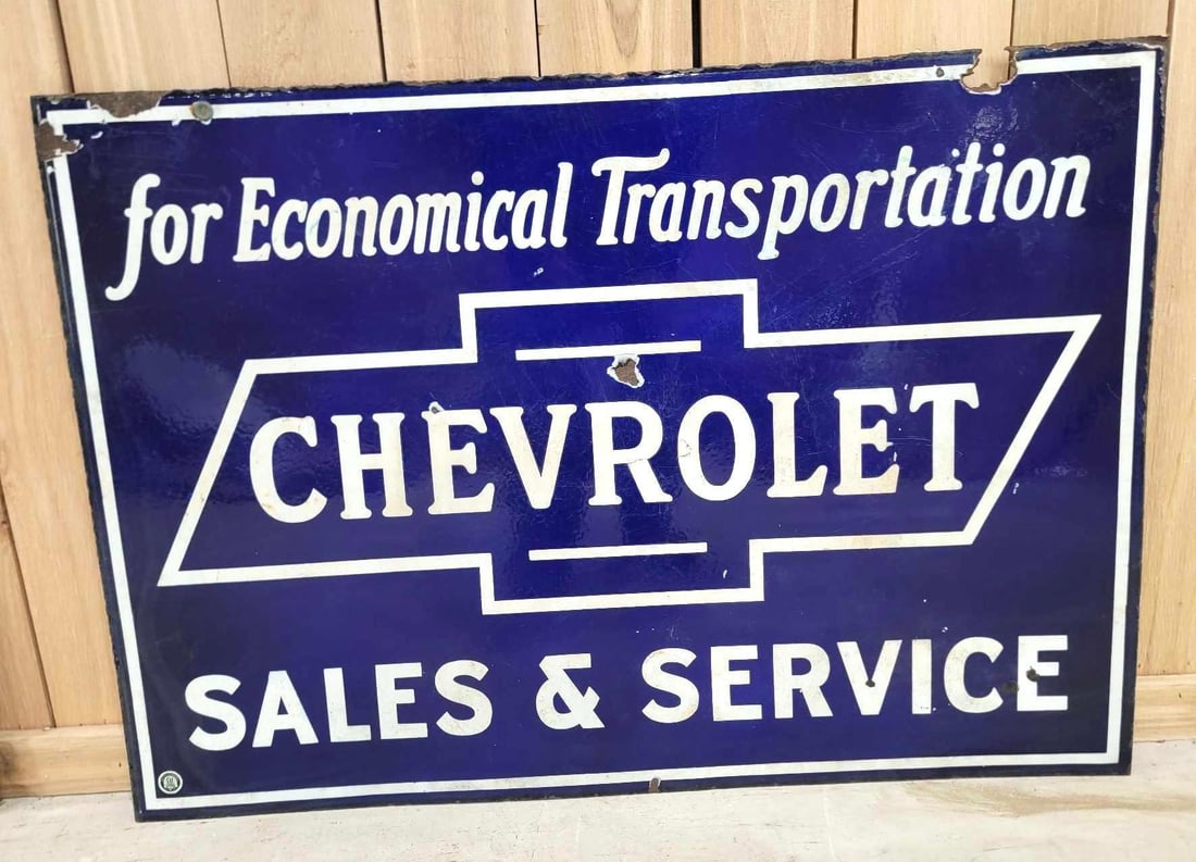 Chevrolet "for Economical Transportation" Porcelain Sign (TAC): rated 7.5, 28"x40", the DSP sign has good color and gloss, hs chip, wear and fine scratches, marked Burdick. Rarity 4. TAC #063390